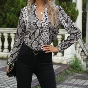 Snakeskin printed notched neck blouse